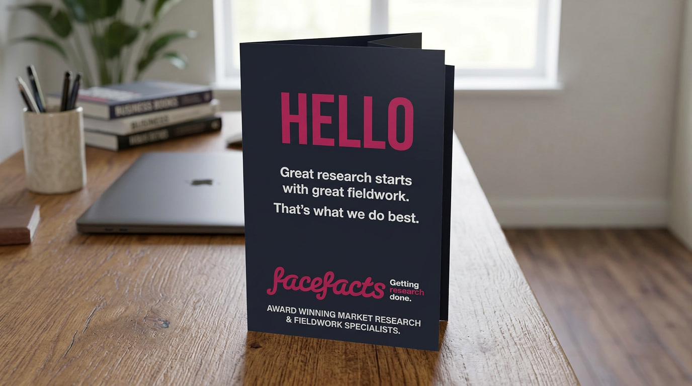 nano-banana-2_put_this_cover_image_of_Face_Facts_folded_A4_leaflet_stood_up_on_a_desk_in_a_sma-0